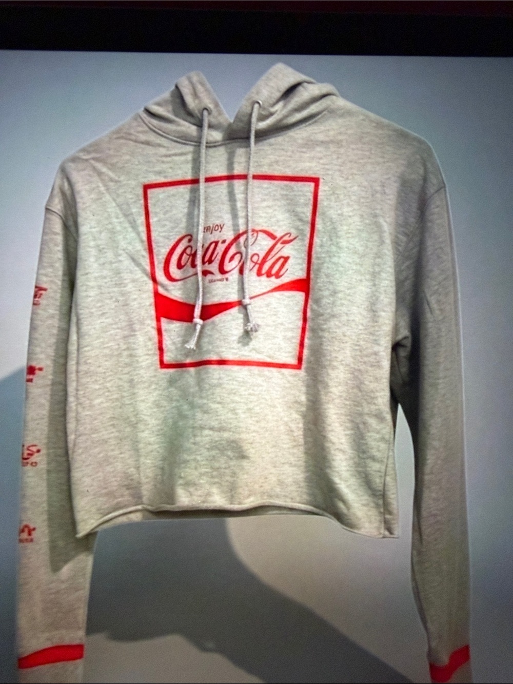 Coca Cola Light Gray Cropped Hoodie with Red Logo